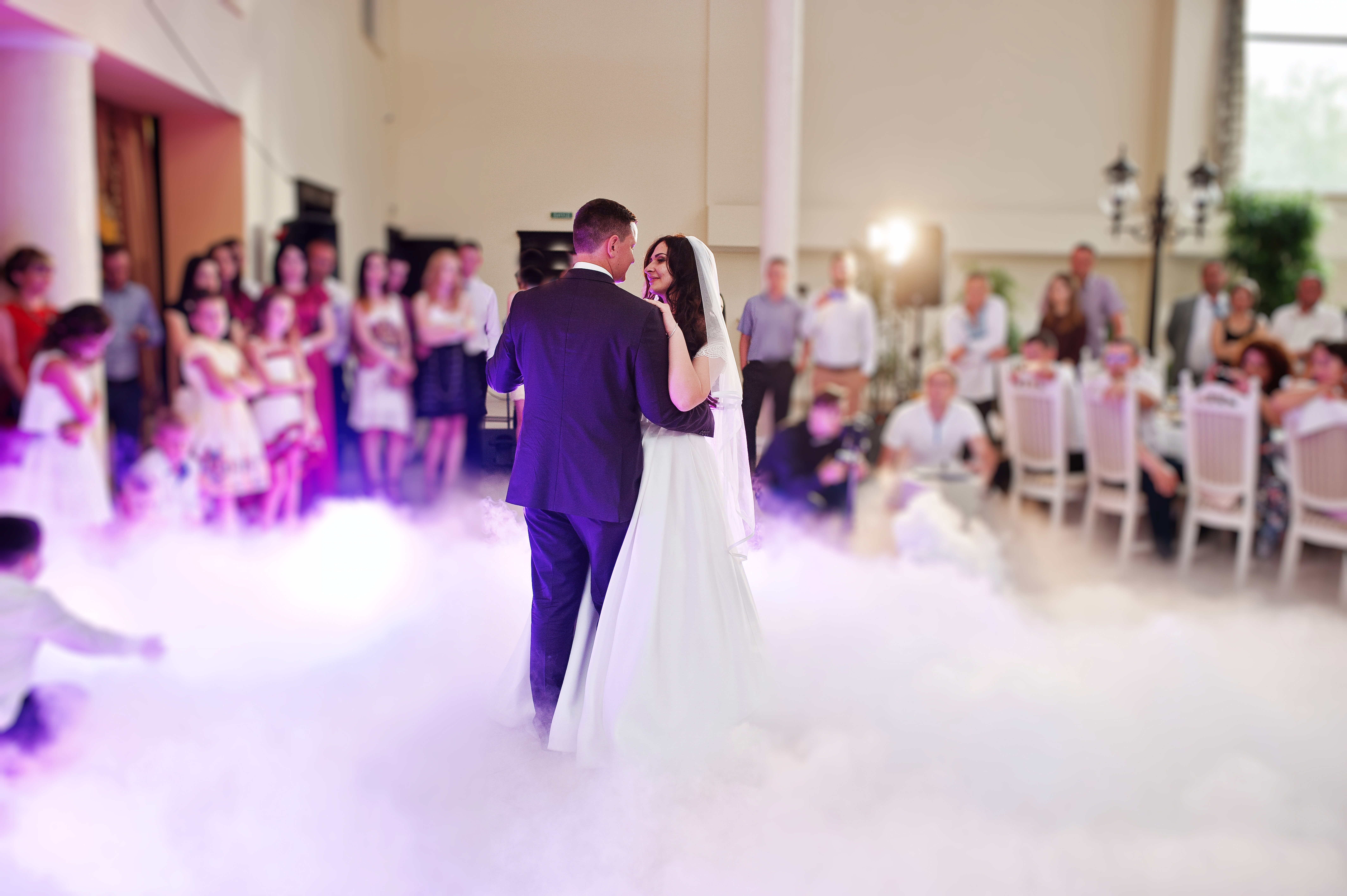 Awesome first wedding dance with smoke and rose purple lights.